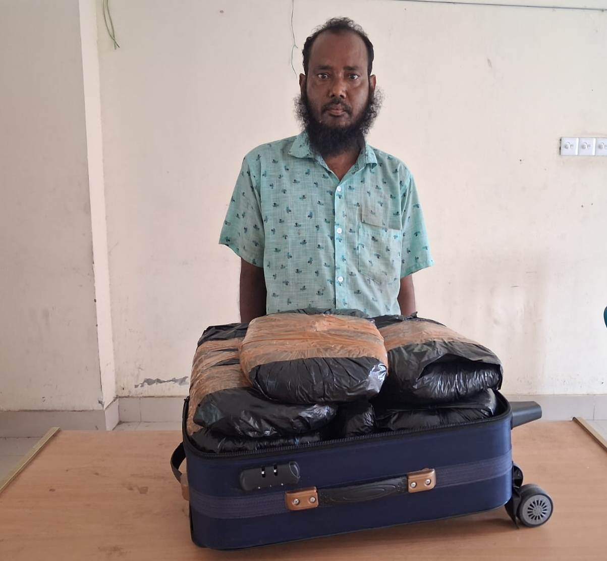 Search on suspicion of stolen goods from the bridge in Kotalipara, 10 kg of marijuana found in trolley bag