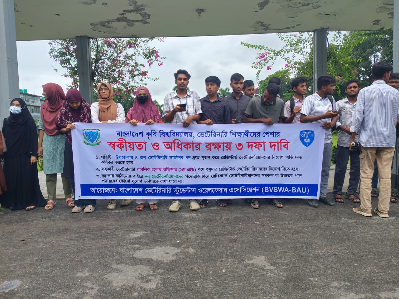 BAU students form human chain over three-point demand