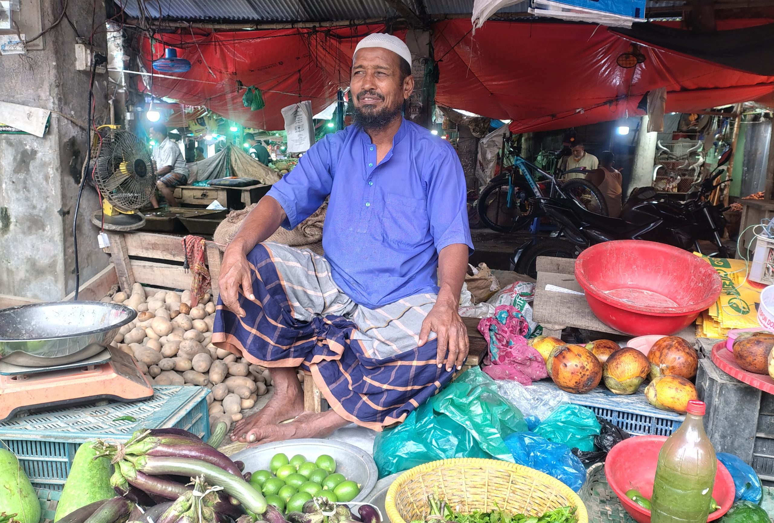Comilla Chandina Barura newspaper hawker now a vegetable seller
