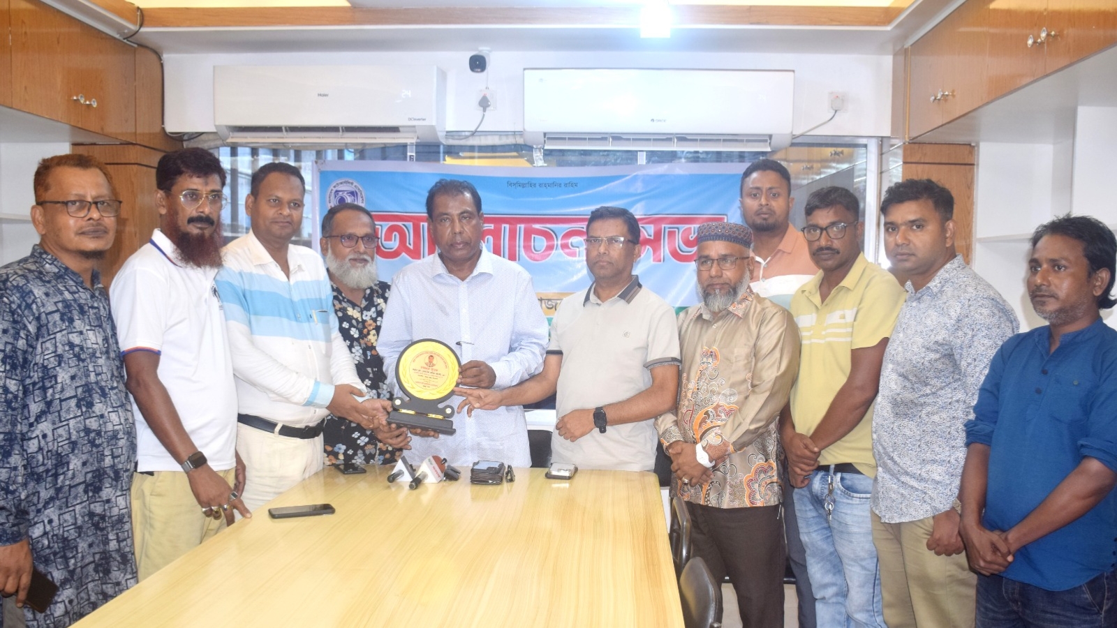Badsha MPK Photojournalist Branch receives reception in Bogura