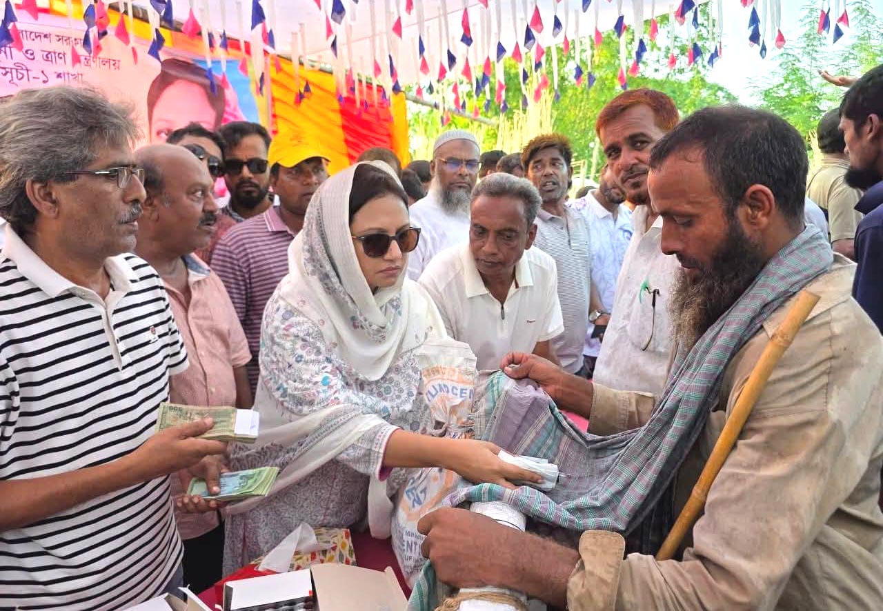 Distribution of relief among water-locked families in Lalpur